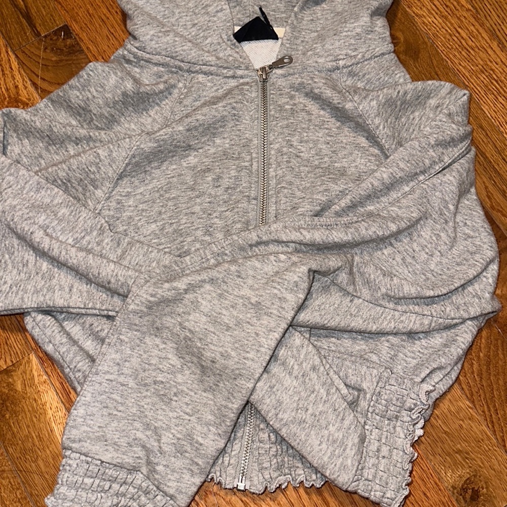 Out from under urban outfitters cropped jacket